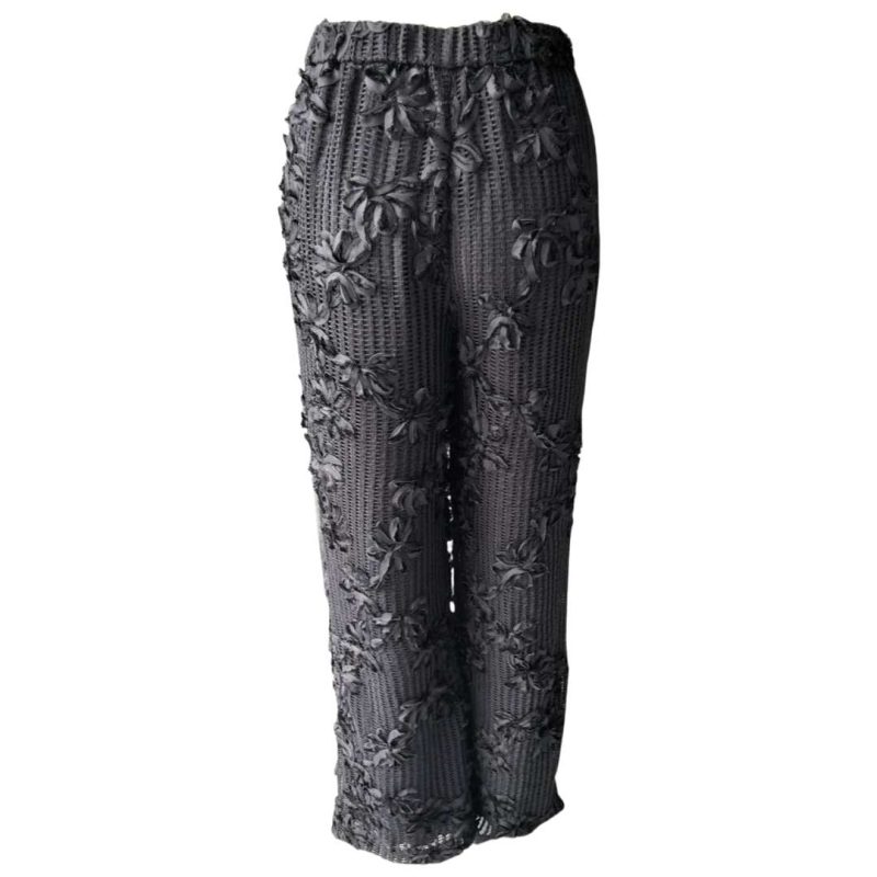 black applique openwork pants back